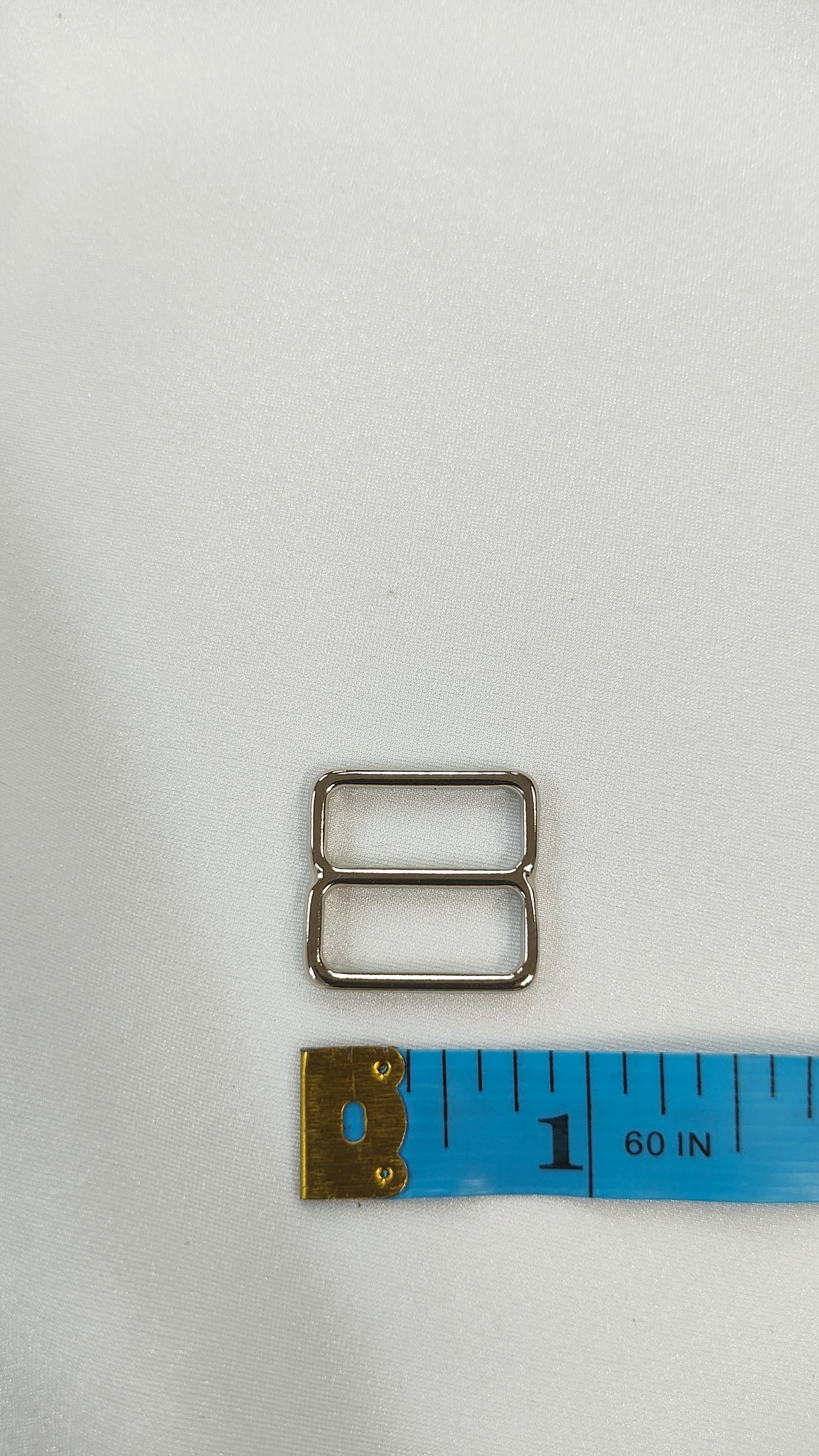 Ajustador plateado17mm (por docena)