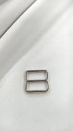Ajustador plateado17mm (por docena)
