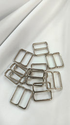 Ajustador plateado17mm (por docena)
