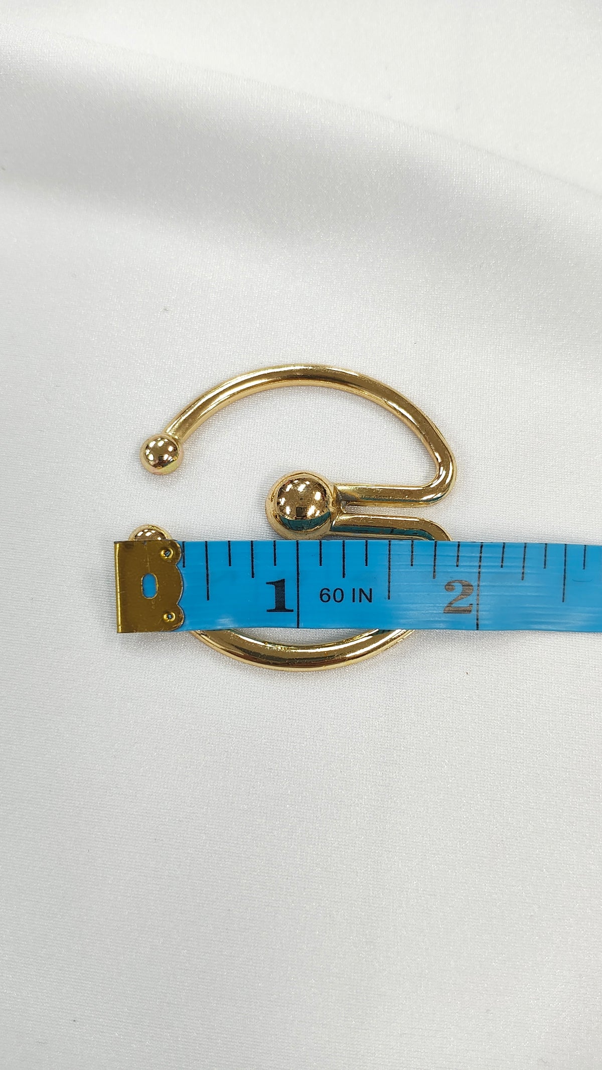 Aro metalico semi circulo dorado