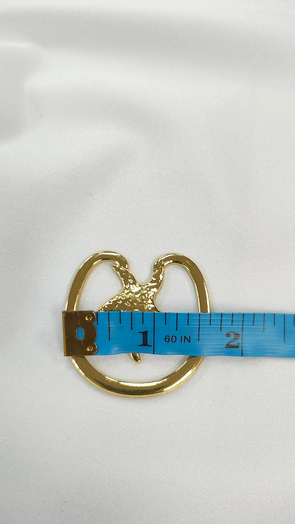 Adorno metalico estrella de mar dorado