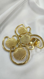 Adorno metalico seashell dorado