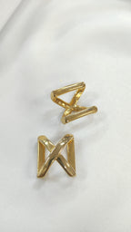 Pasador metalico en X dorado