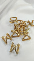 Pasador metalico en X dorado