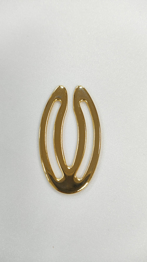 Adorno metalico ovalo dorado