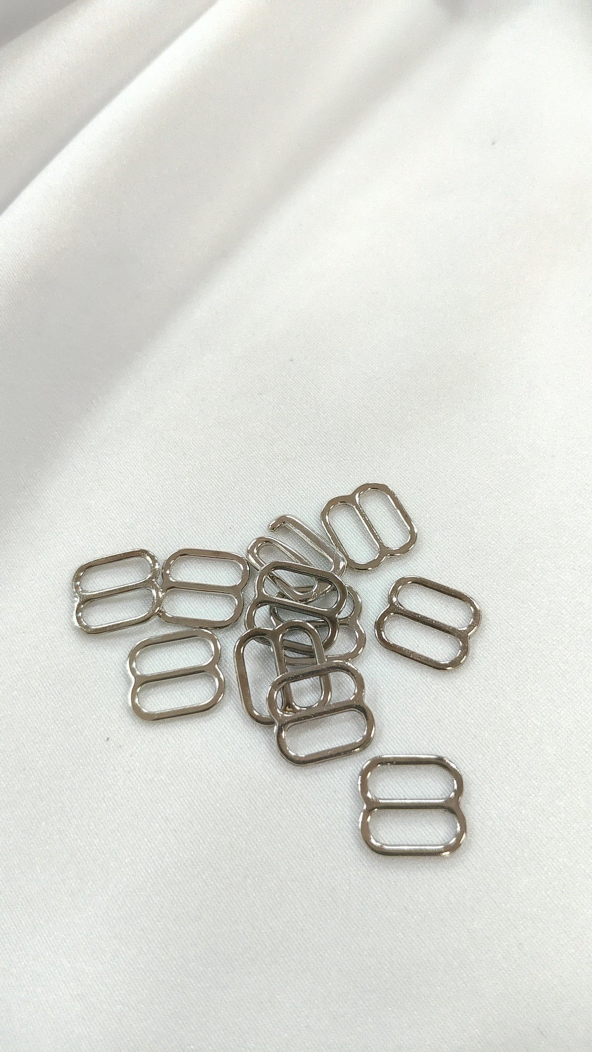 Ajustador plateado 10mm (por docena)