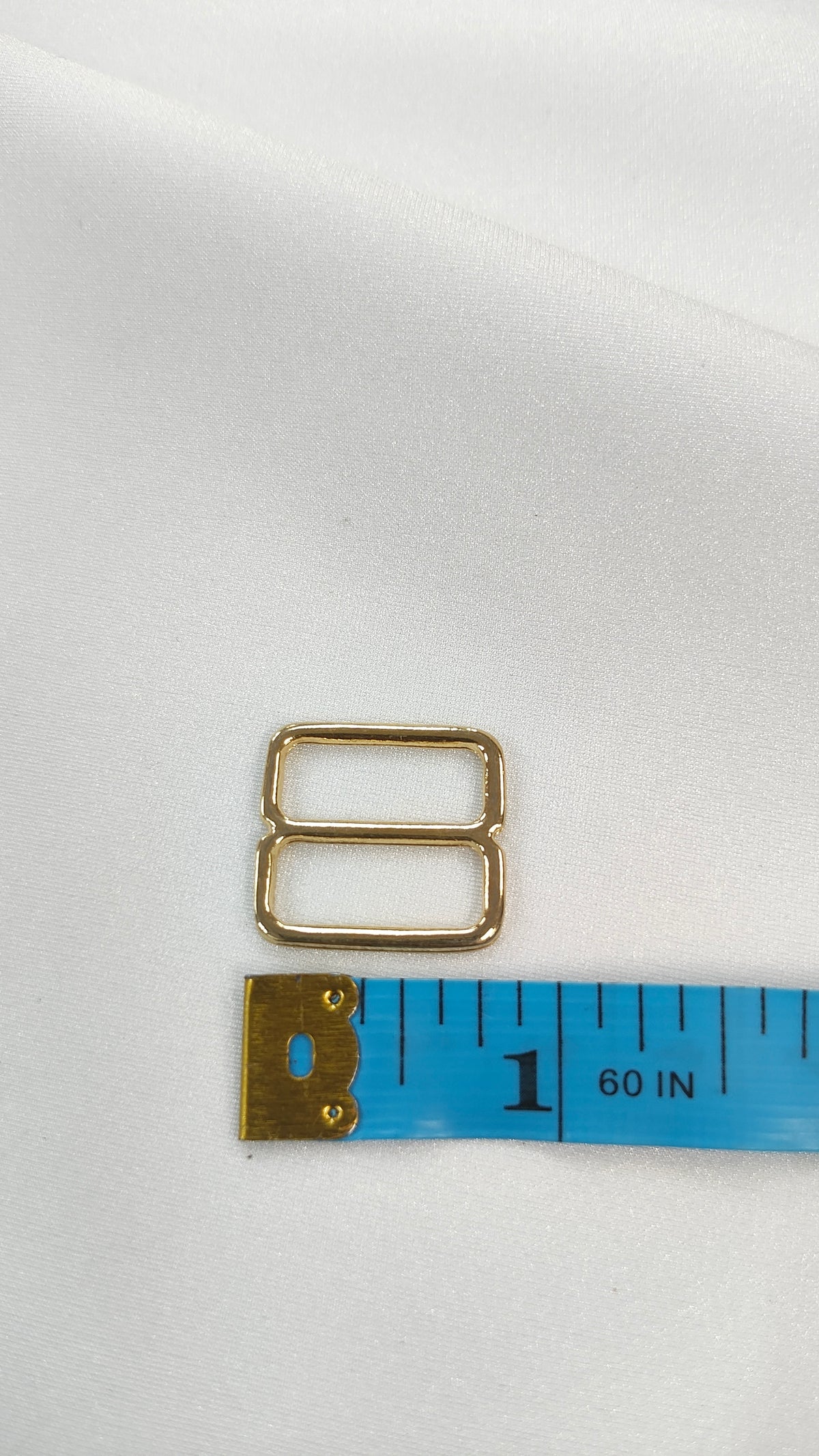 Ajustador dorado 17mm (por docena)