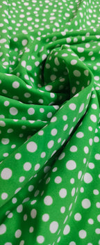 Polka dots green base