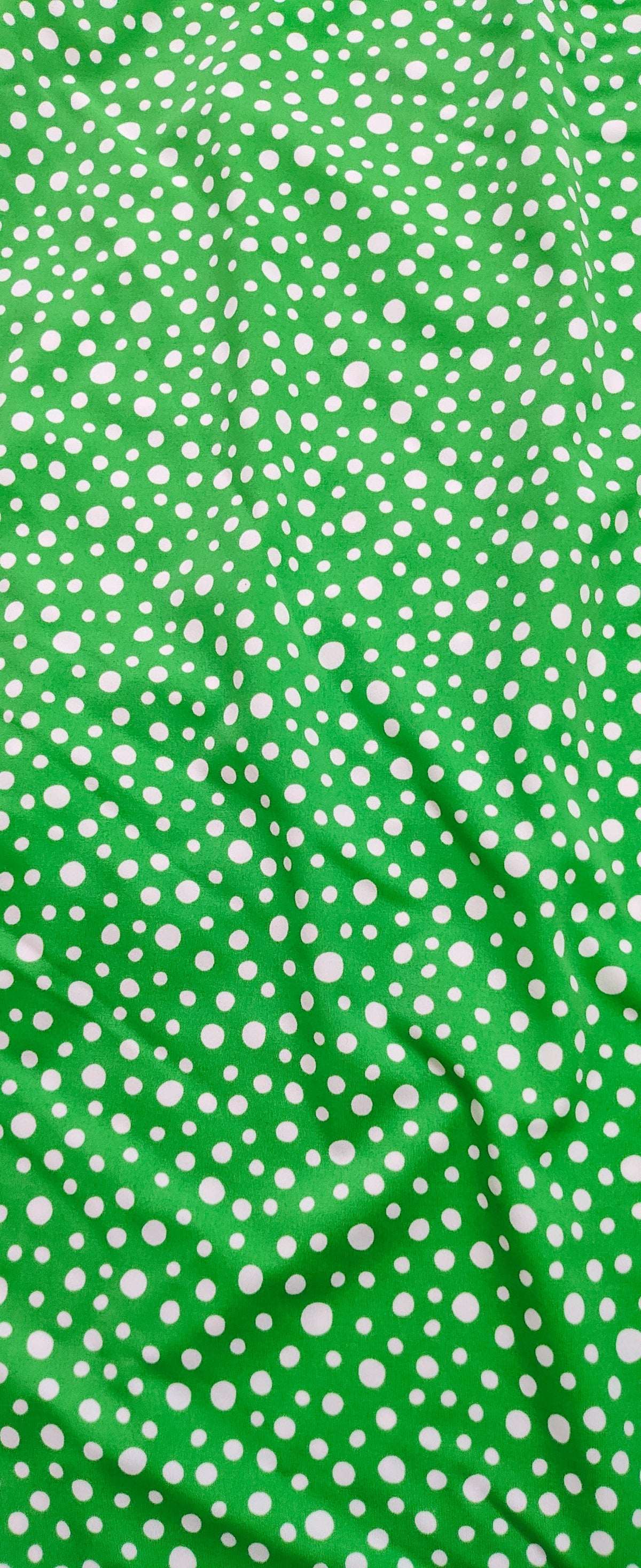 Polka dots green base