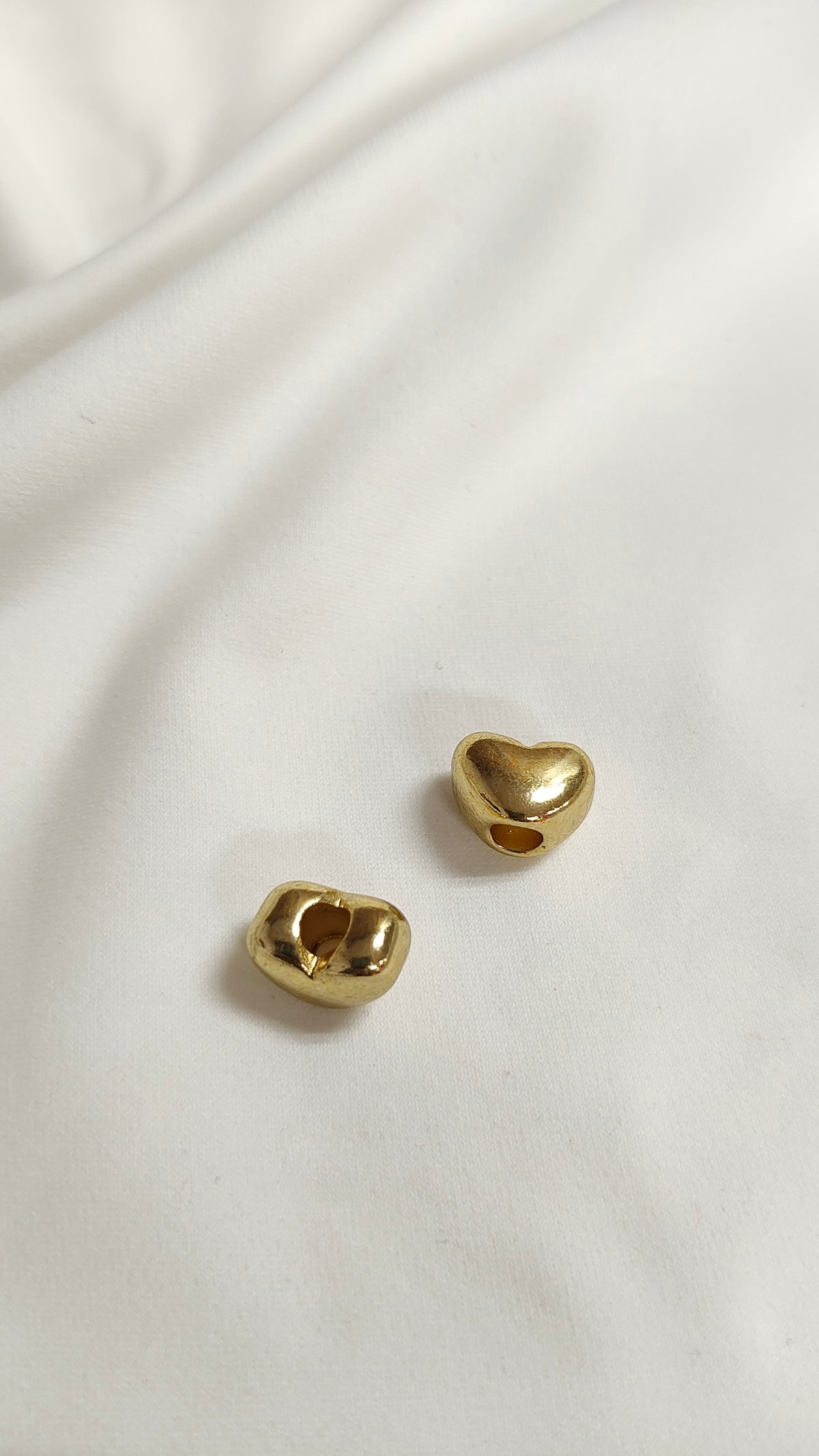 Tapa nudo dorado de corazon (docena)