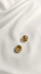 Tapa nudo dorado decorado (docena)