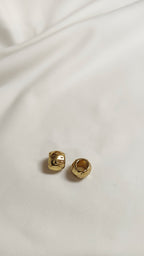 Tapa nudo dorado en relieve (docena)