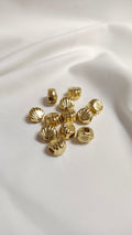 Tapa nudo dorado seashell (docena)