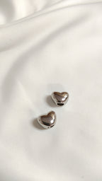 Tapa nudo plateado de corazon (docena)