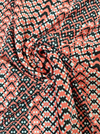 Jersey estampado mosaico peach y negro