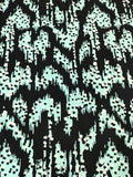 Jersey estampado negro y verde menta