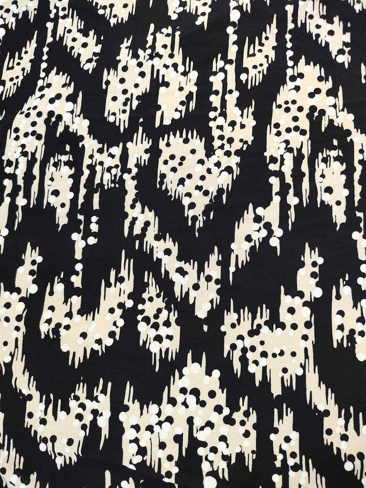 Jersey estampado negro y beige
