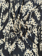 Jersey estampado negro y beige