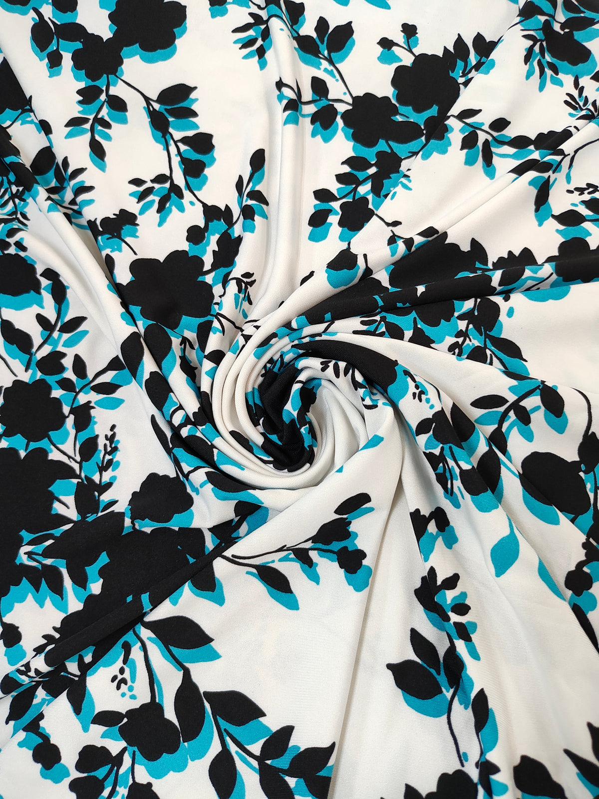 Jersey estampado floral azul, negro y blanco